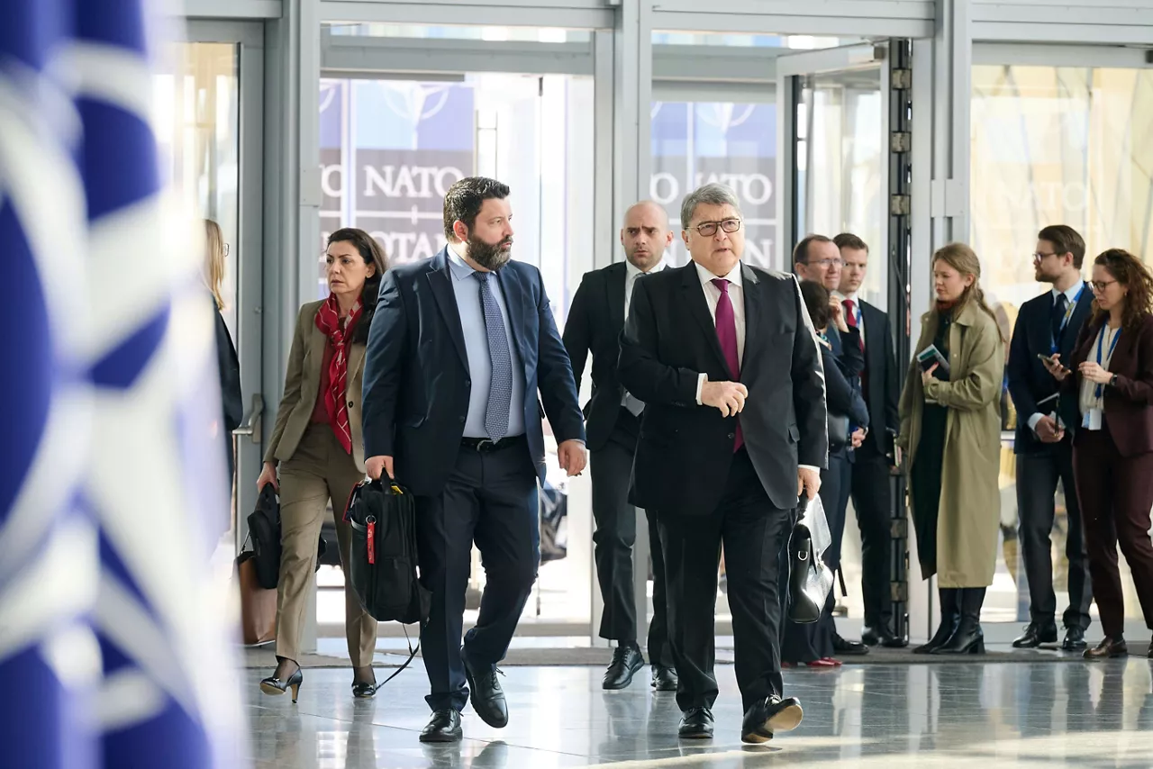 Minister of Foreign Affairs of Romania, Emil Hurezeanu, arriving at the NATO Foreign Ministerial