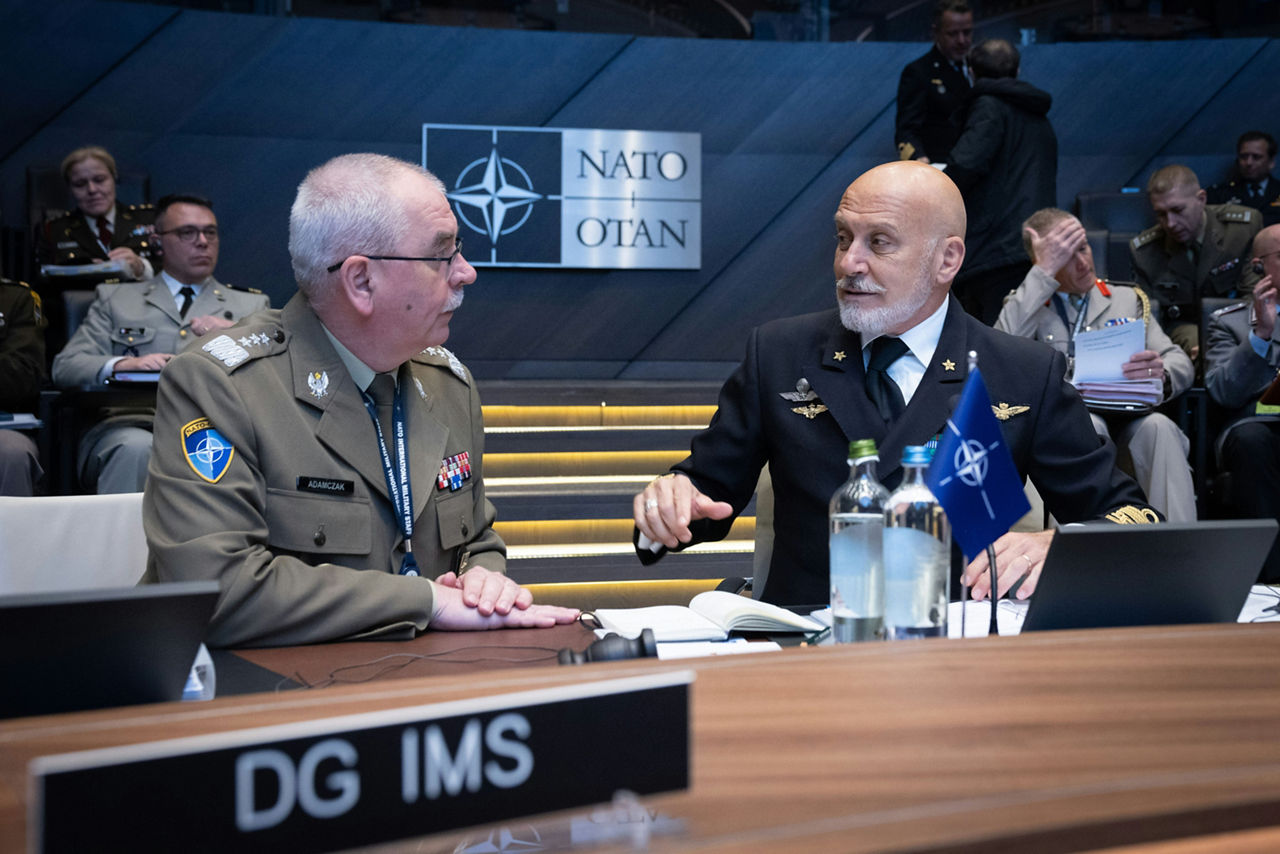 The Director General of the International Military Staff, Lieutenant General Janusz Adamczak talking with the Chair of the NATO Military Committee, Admiral Giuseppe Cavo Dragone 