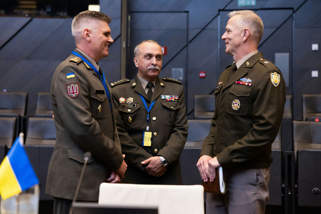 The NATO Military Representative of Ukraine, Major General Serhii Salkutsan talking with the Acting NATO Military Representative of the United States, Brigadier General Sean M. Flynn