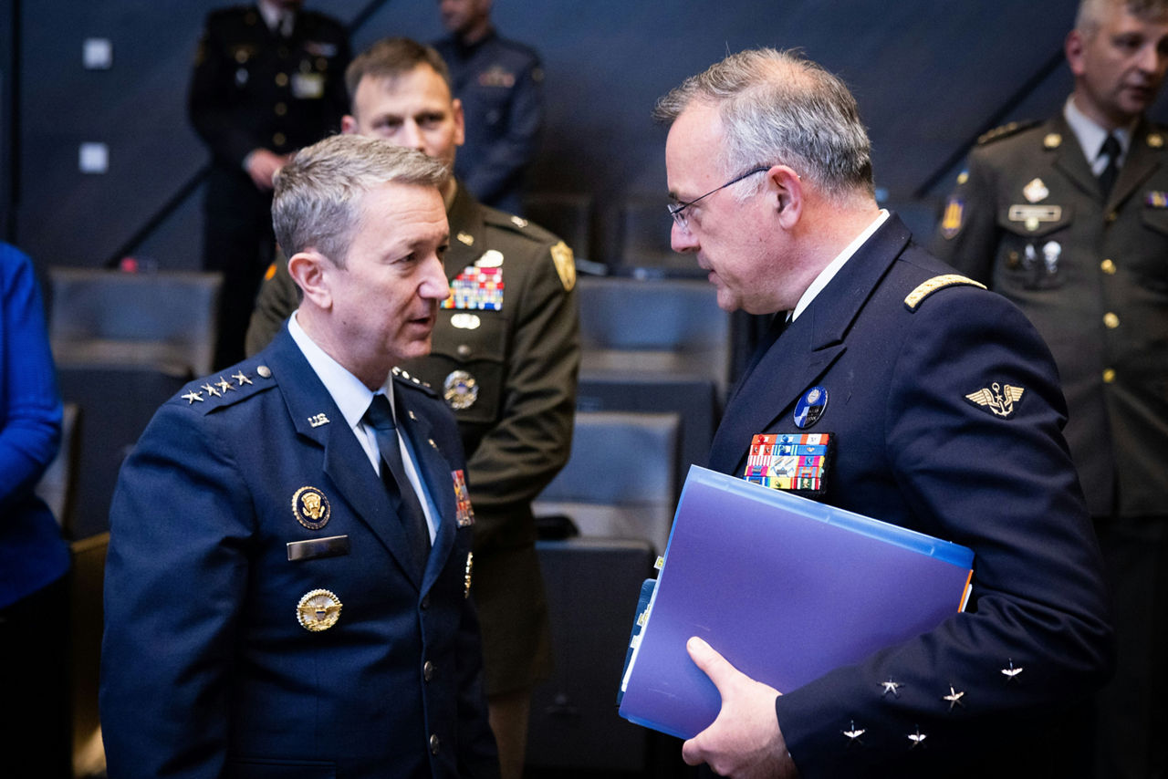 The NATO Chief of Defence of the United States, General Dan Caine talking with the Supreme Allied Commander Transformation – SACT, Admiral Pierre Vandier