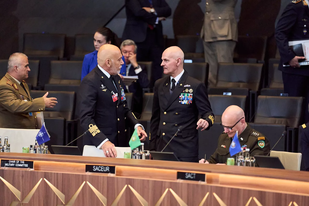 Left: Chair of the Military Committee Admiral Giuseppe Cavo Dragone