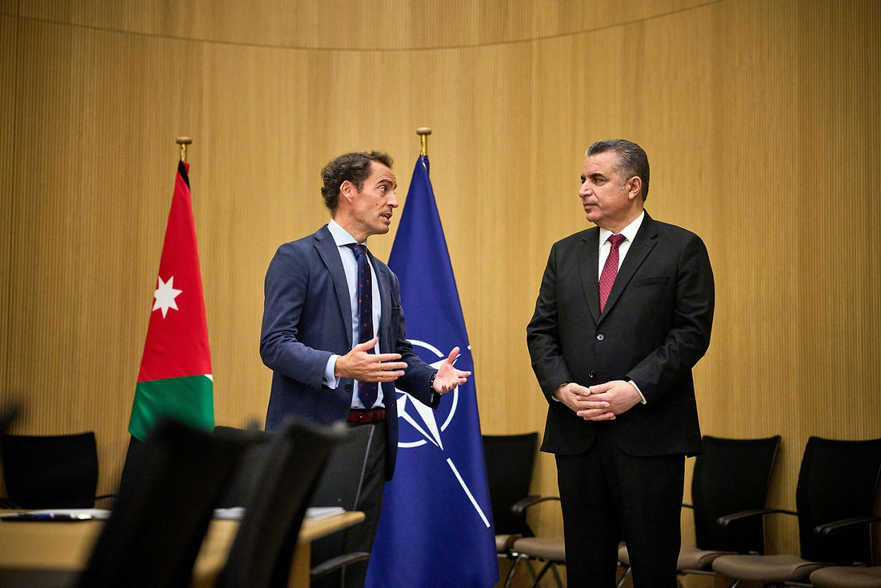 Ambassador Yousef Bataineh, Head of the Mission of Jordan to NATO and Javier Colomina, Special Representative of NATO for the Southern Neighbourhood sign a legal agreement for the opening of the NATO Liaison Office (NLO) in Amman