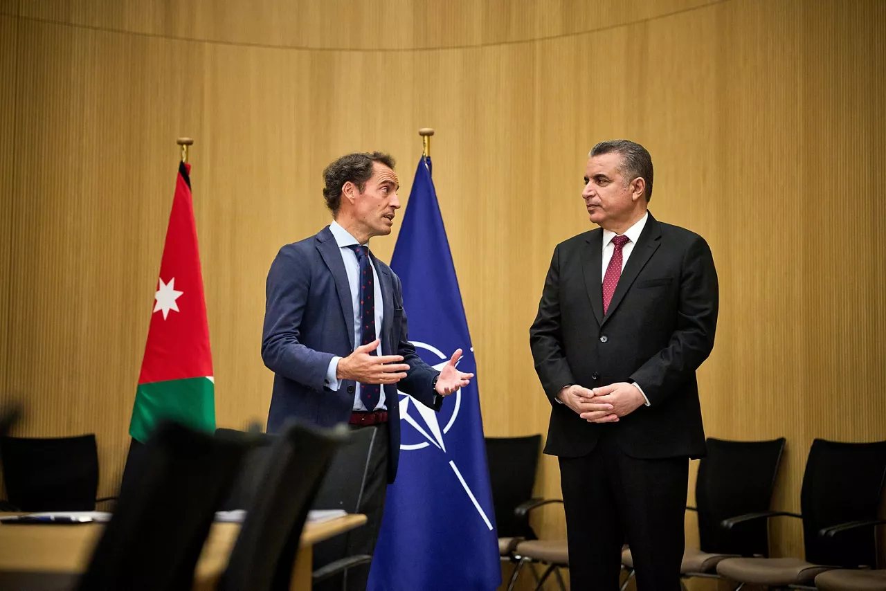 Ambassador Yousef Bataineh, Head of the Mission of Jordan to NATO and Javier Colomina, Special Representative of NATO for the Southern Neighbourhood sign a legal agreement for the opening of the NATO Liaison Office (NLO) in Amman