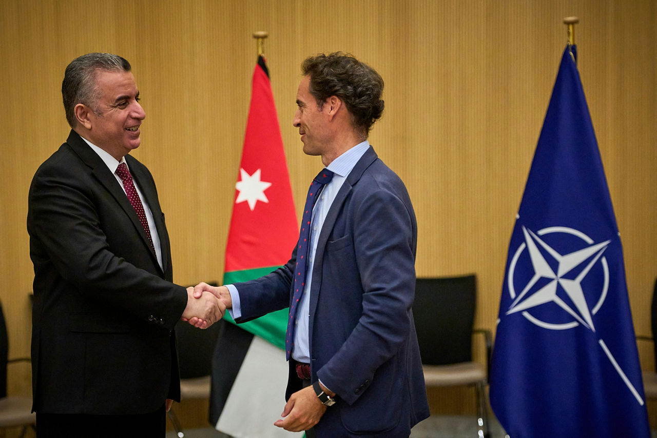 Ambassador Yousef Bataineh, Head of the Mission of Jordan to NATO and Javier Colomina, Special Representative of NATO for the Southern Neighbourhood sign a legal agreement for the opening of the NATO Liaison Office (NLO) in Amman