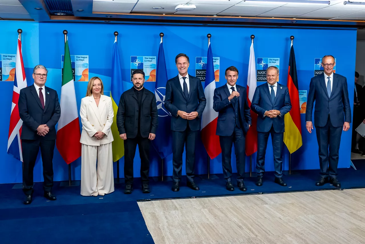 Keir Starmer (Prime Minister, United Kingdom), Giorgia Meloni (Prime Minister, Italy), Volodymyr Zelenskyy (President, Ukraine), NATO Secretary General Mark Rutte,Emmanuel Macron (President, France), Donald Tusk (Prime Minister, Poland) and Friedrich Merz (Chancellor of Germany)