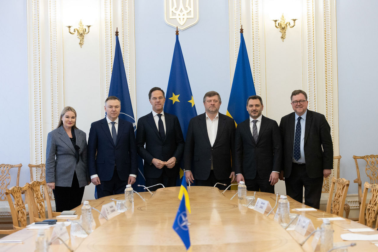 [from left to right] Alyona Getmanchuk, Head of  Ukraine's Mission to NATO, Oleksandr Zavitnevych, Chairman of the Committee on National Security, Defence and Intelligence of the Verkhovna Rada of Ukraine, NATO Secretary General Mark Rutte, Oleksandr Korniyenko, First Deputy Chairman of the Verkhovna Rada of Ukraine, Yehor Cherniev, Deputy Chairman of the Parliamentary Committee on National Security, Defence and Intelligence and Head of the Permanent Delegation of Ukraine to the NATO Parliamentary Assembly and Patrick Turner, NATO Senior Representative to Ukraine