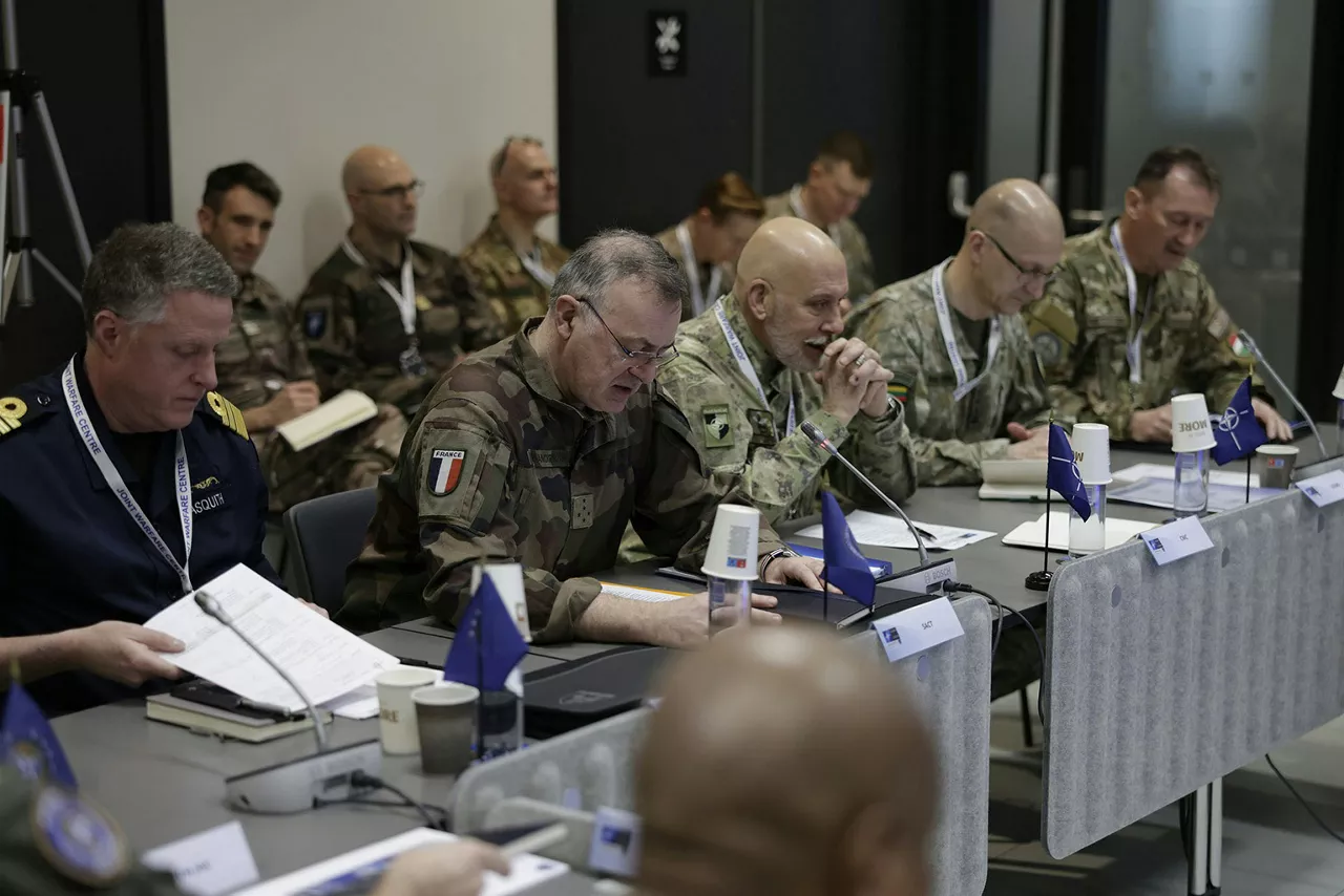 Left to Right: Chief of Staff to Supreme Allied Commander Transformation,​ Vice Admiral ​Simon Asqiuth; Supreme Allied Commander Transformation, ​​​Admiral Pierre Vandier; Chair of the NATO Military Committee, Admiral Giuseppe Cavo Dragone​; Director General of the International Military Staff, Lieutenant General Remigijus Baltrėnas; ​Secretary to the NATO Military Committee, Brigadier General Jozsef Szucs​