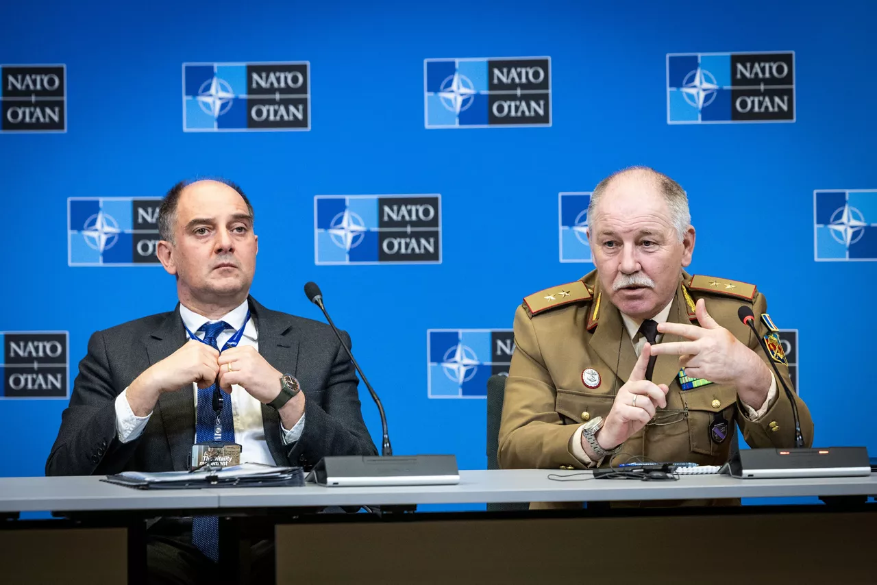 Left to Right – Mr Nick Catsaras, Assistant Secretary General, Defence Planning and Policy, and Major General Remus Hadrian Bondor, Romanian Military Representative to NATO