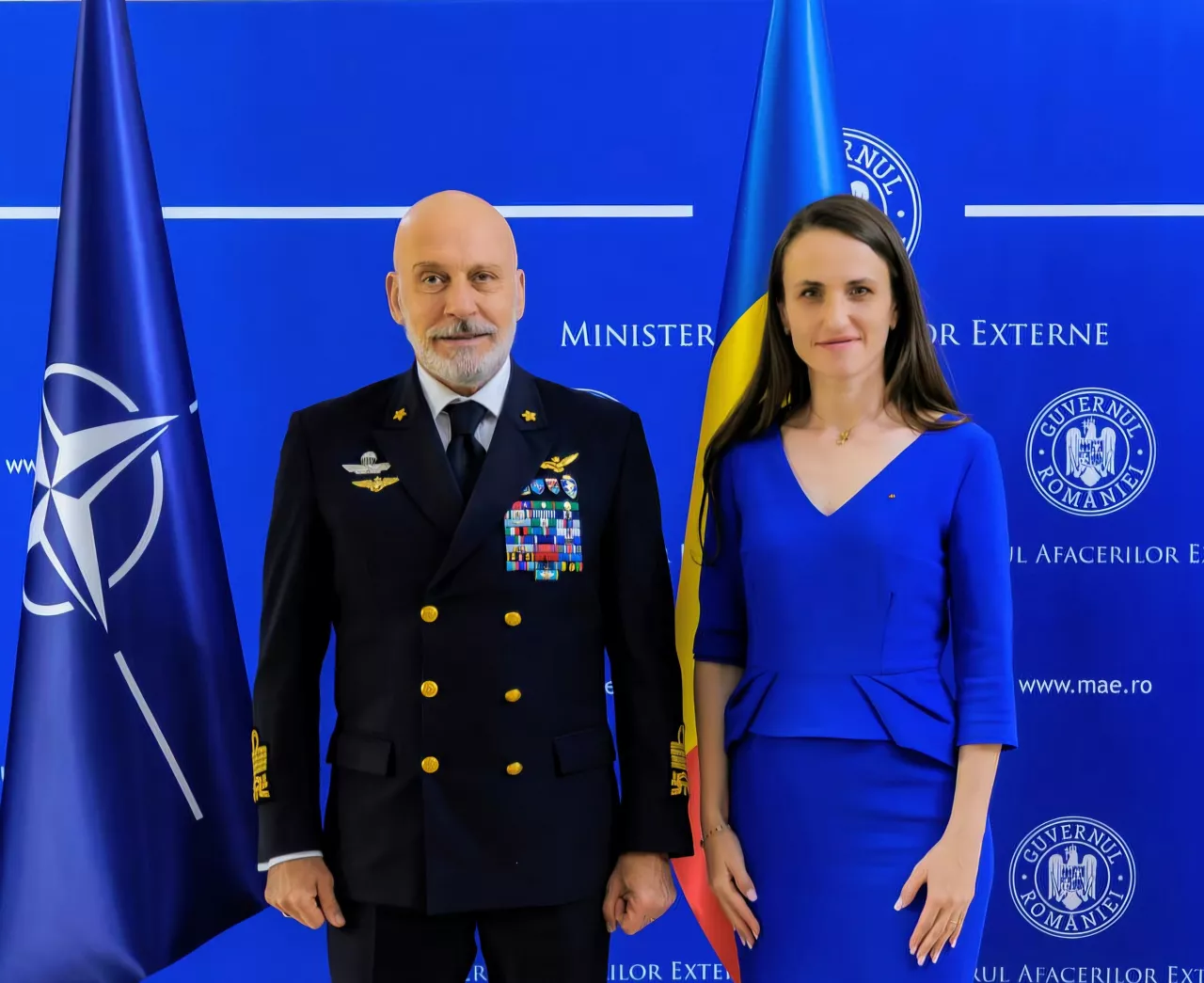 The Chair of the NATO Military Committee, Admiral Giuseppe Cavo Dragone, with the Minister of Foreign Affairs of Romania, Ms. Oana Țoiu.