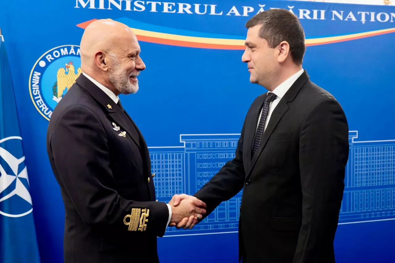 The Chair of the NATO Military Committee, Admiral Giuseppe Cavo Dragone, with the Minister of National Defence of Romania, Mr. Radu-Dinel Miruță.