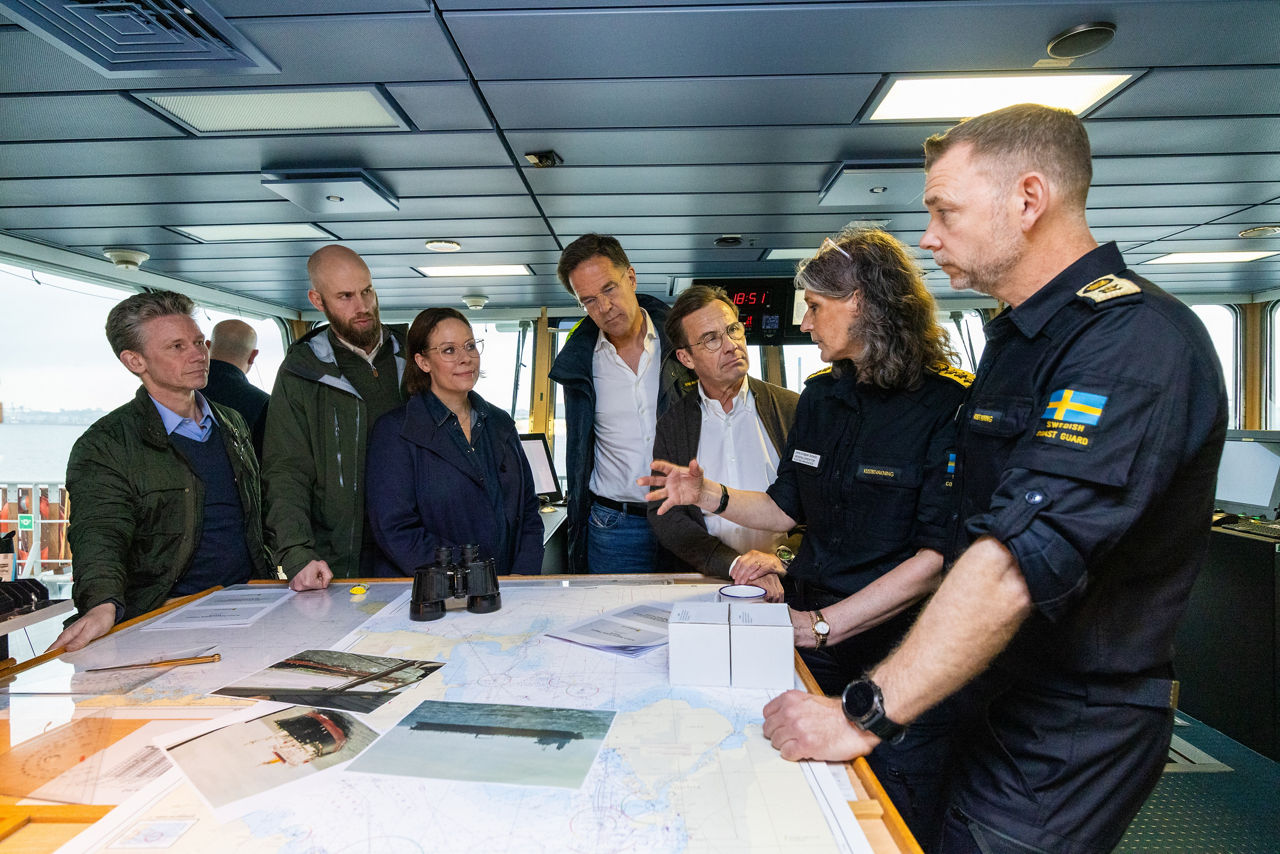 NATO Secretary General Mark Rutte signing the guestbook at the Swedish Coast Guard Ship Amfitrite