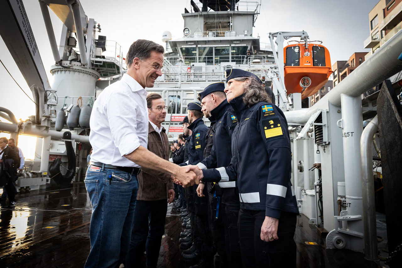 NATO Secretary General Mark Rutte with the crew of the Swedish Coast Guard Ship Amfitrite