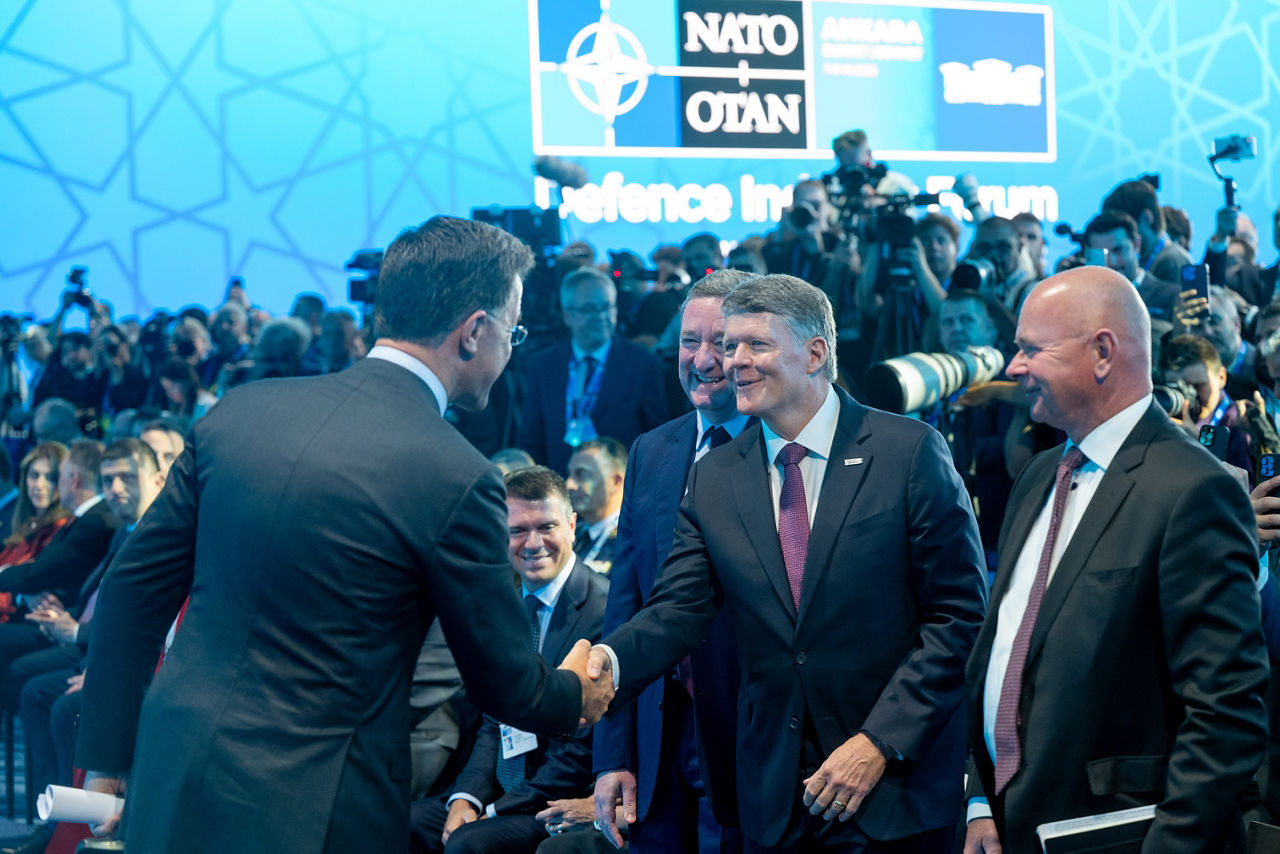 NATO Secretary General Mark Rutte reveials major capability announcements at the NATO Summit Defence Industry Forum. NATO Secretary General Mark Rutte with Executive Vice President Global Business at Airbus Defence and Space Ben Bridge, Northrop Grumman Vice President International Frank Morley and CEO of Saab Group Micael Johansson