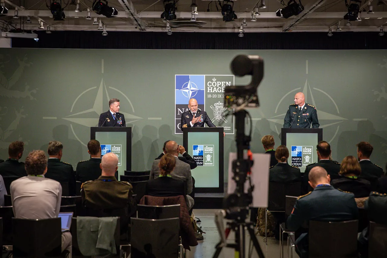 Left to Right - The Public Affairs and StratCom Advisor (PASCAD), Captain Navy Giovanni Galoforo, the Chair of the NATO Military Committee, Admiral Giuseppe Cavo Dragone, and the Chief of Defence of Denmark, General Michael Wiggers Hyldgaard.