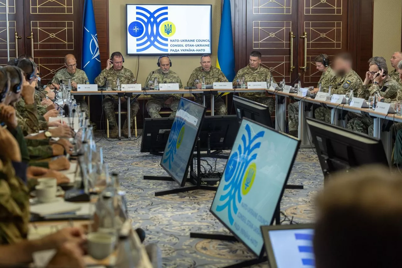 The Chair of the NATO Military Committee, Admiral Giuseppe Cavo Dragone, at the NATO-Ukraine Council during the NATO Military Committee visit to Ukraine
