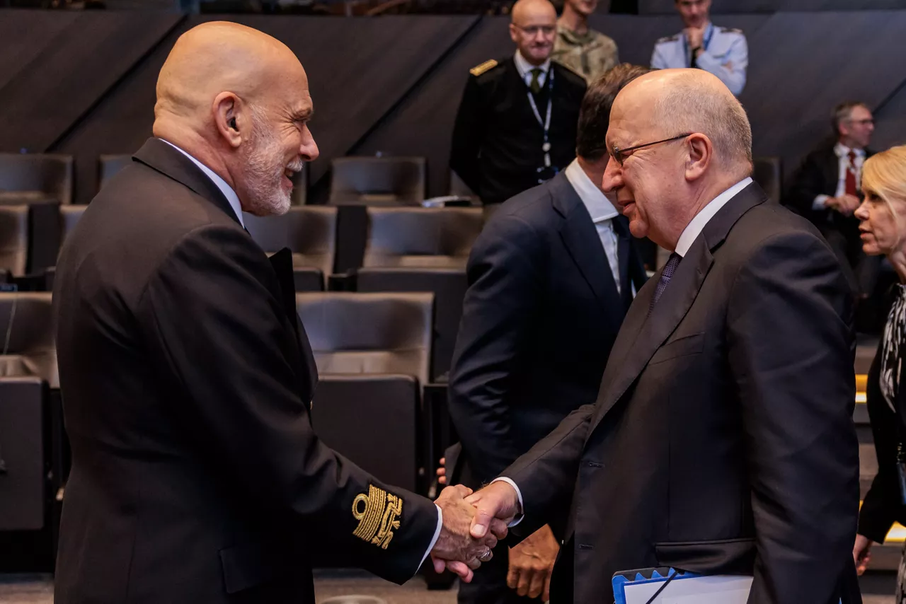 Chair of the NATO Military Committee (CMC) Admiral Giuseppe Cavo Dragone with the EU Commissioner for Defence and Space, Andrius Kubilius, at the North Atlantic Council (NAC) meeting at the NATO Headquarters in Brussels, Belgium