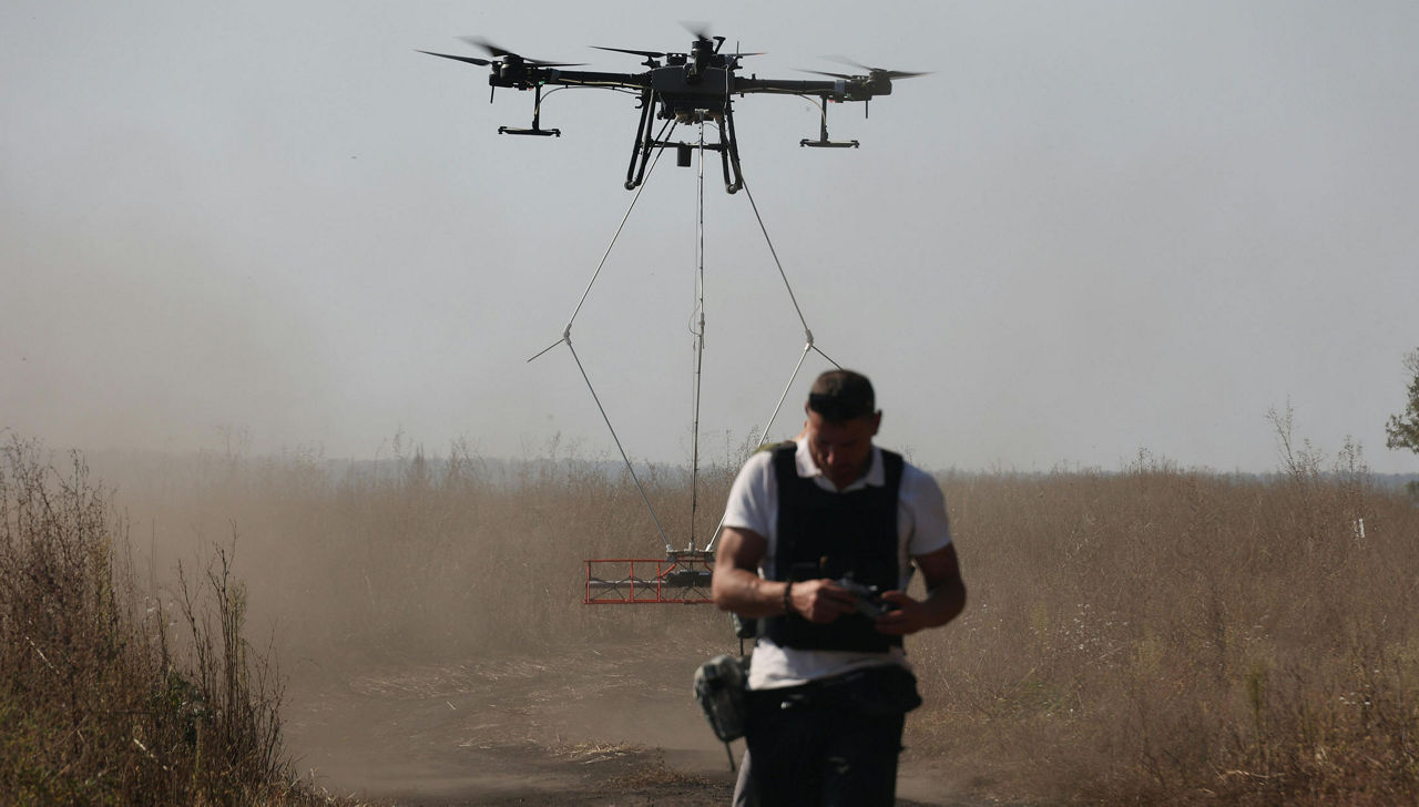 Testing of an SPS-supported UAV-based system to detect landmines in an agricultural region in Kharkiv, Ukraine, June 2023. Photo credit: Vyacheslav Madiyevskyy.