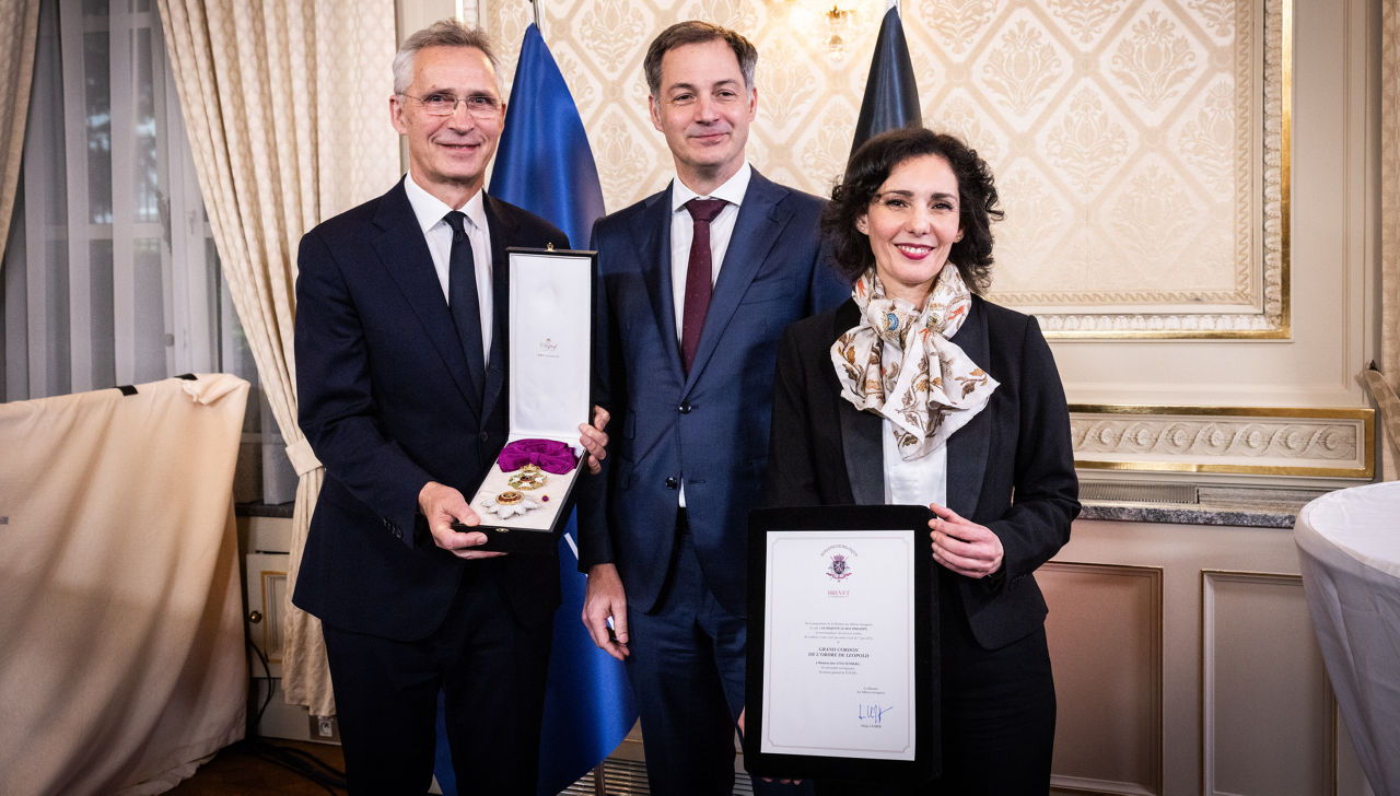 NATO Secretary General Jens Stoltenberg receives the Grand Cordon of the Order of Leopold from the Prime Minister of Belgium, Alexander de Croo.