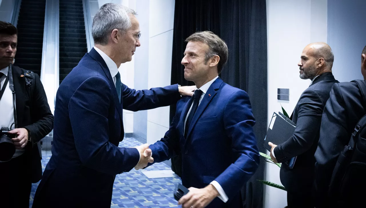 Left to right: NATO Secretary General Jens Stoltenberg greeting President Emmanuel Macron (France)