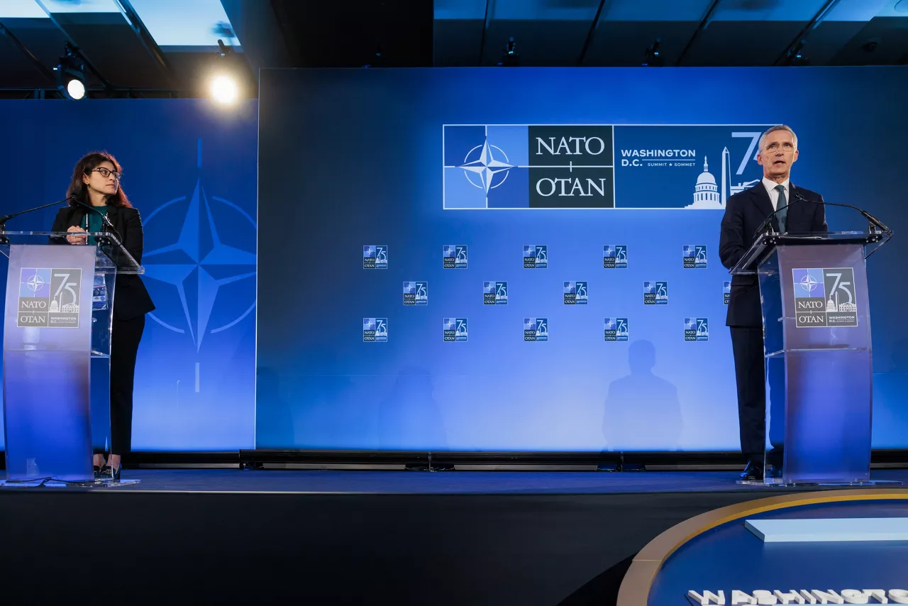 NATO Secretary General Jens Stoltenberg and NATO Spokesperson Farah Dakhlallah