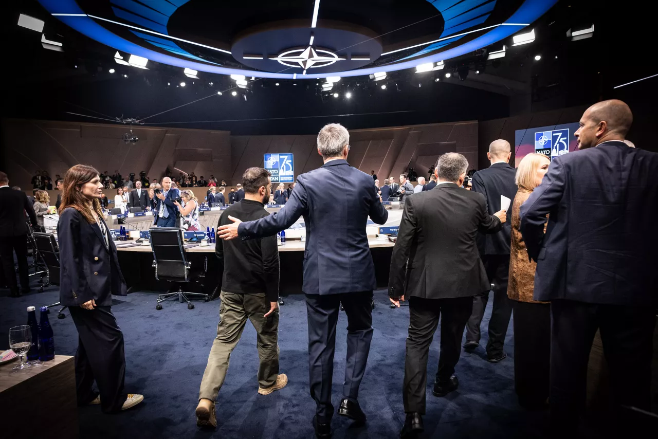 Left to right: President Volodymyr Zelenskyy (Ukraine)  and NATO Secretary General Jens Stoltenberg walking into the meeting room