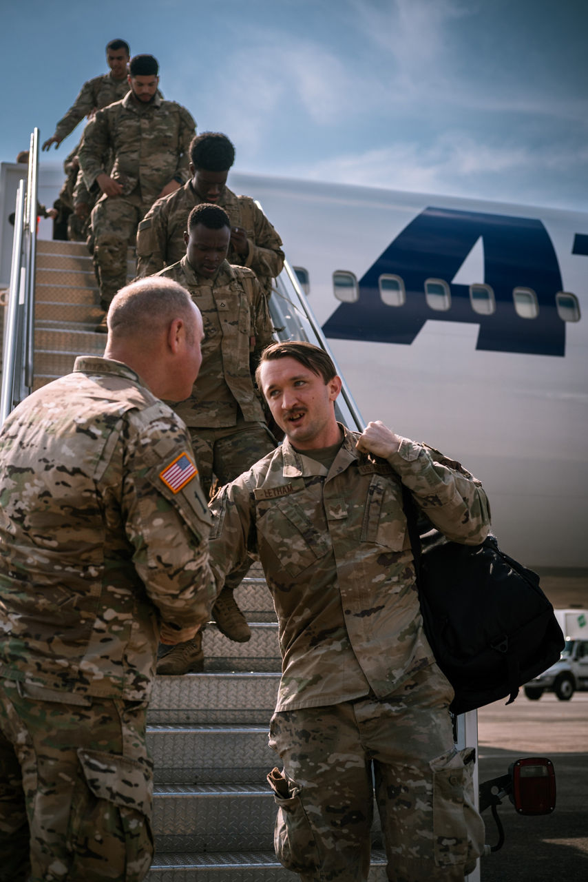 A US Army soldier with the 2nd Armored Brigade Combat Team greets his commander after arriving at Hunter Army Airfield in Savannah, Georgia, following a nine-month deployment to Eastern Europe.

The brigade was deployed throughout Latvia, Lithuania and Poland as part of Operation Atlantic Resolve, a broad surge of US forces to Europe to deter aggression and reassure NATO Allies.