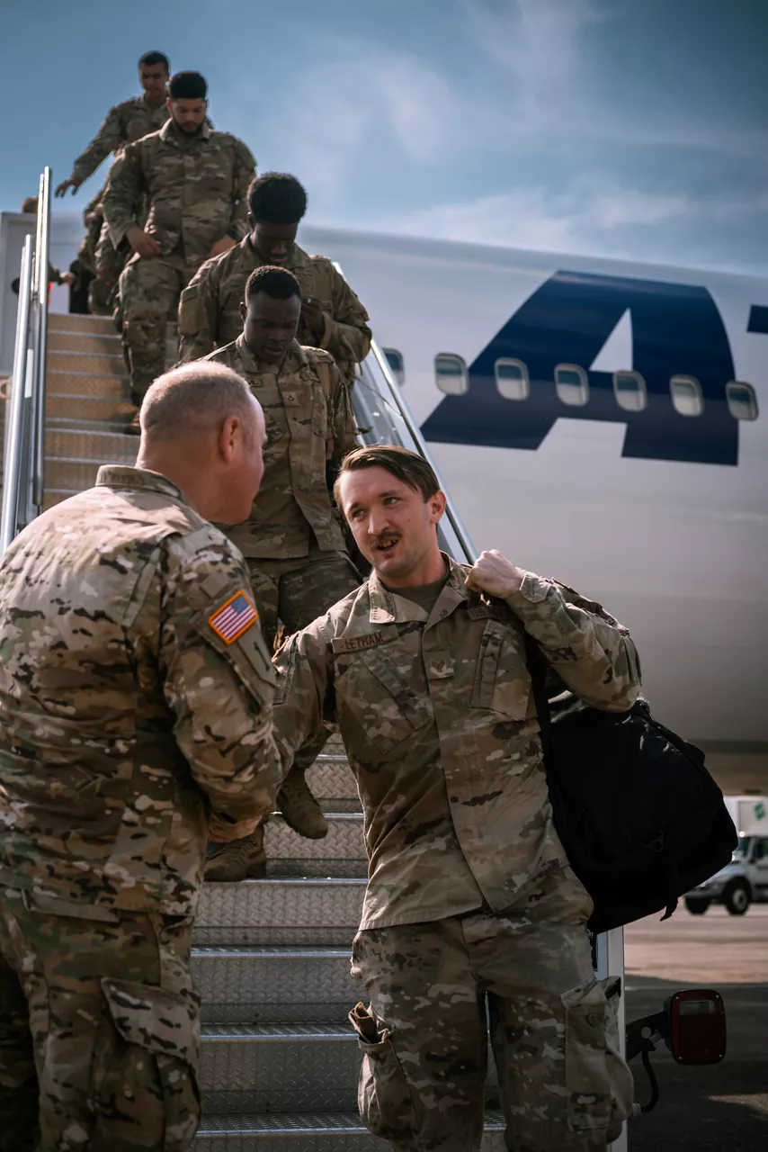 A US Army soldier with the 2nd Armored Brigade Combat Team greets his commander after arriving at Hunter Army Airfield in Savannah, Georgia, following a nine-month deployment to Eastern Europe.

The brigade was deployed throughout Latvia, Lithuania and Poland as part of Operation Atlantic Resolve, a broad surge of US forces to Europe to deter aggression and reassure NATO Allies.