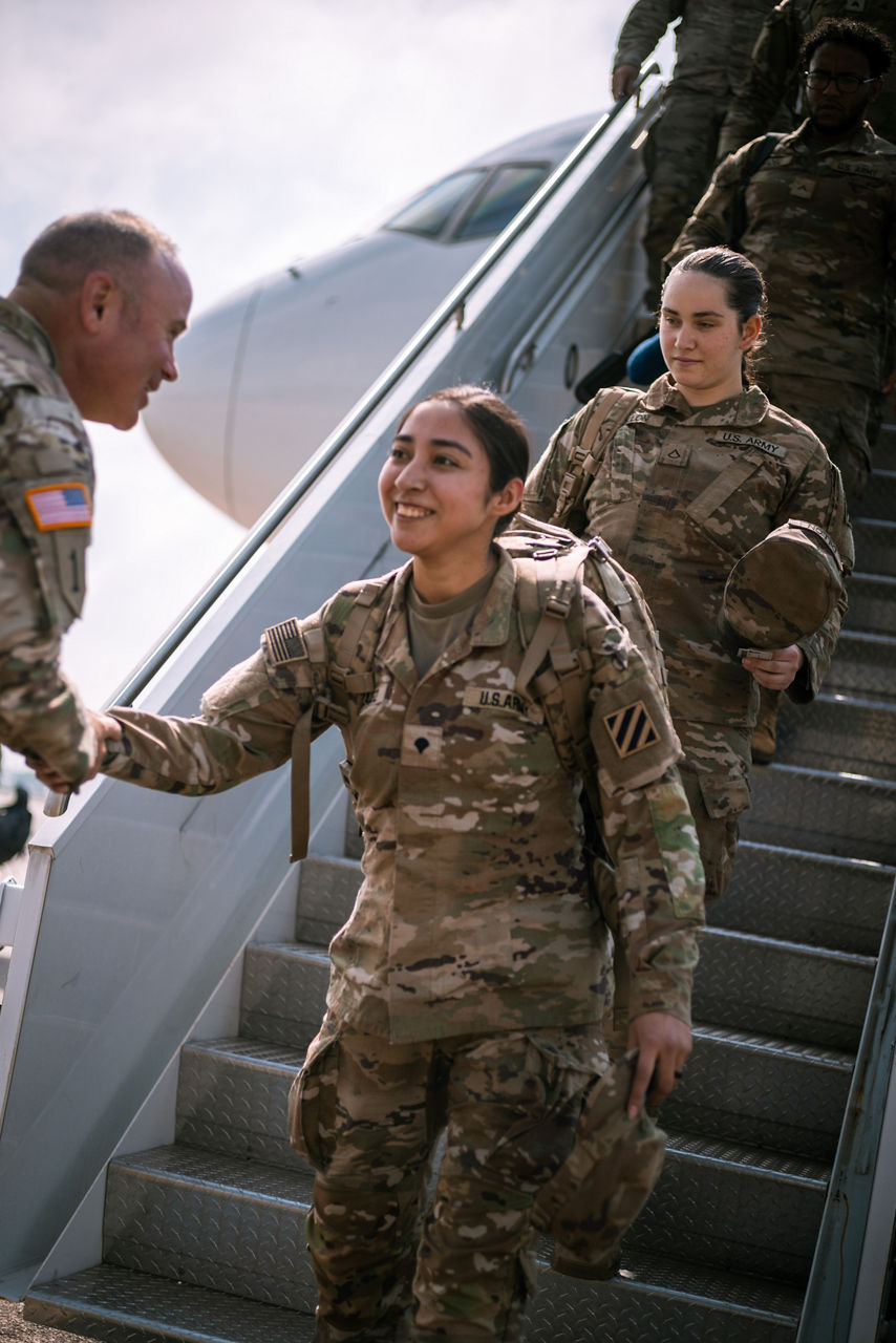 A US Army soldier with the 2nd Armored Brigade Combat Team greets her commander after arriving at Hunter Army Airfield in Savannah, Georgia, following a nine-month deployment to Eastern Europe.

The brigade was deployed throughout Latvia, Lithuania and Poland as part of Operation Atlantic Resolve, a broad surge of US forces to Europe to deter aggression and reassure NATO Allies.