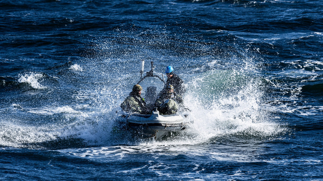 Members of Distressed Sub Group (DSG) in the RIB boat on a mission to communicate with distressed submarine during exercise Dynamic Monarch 24.

At Dynamic Monarch 24, the world’s most challenging submarine rescue exercise, Allies are testing various complex submarine rescue systems. The exercise is designed to practise interoperability among naval forces and streamline rescue operations in the most challenging of environments where reaction time and specialist equipment are key to saving lives. Dynamic Monarch 24 is taking place off the coast of Norway.
