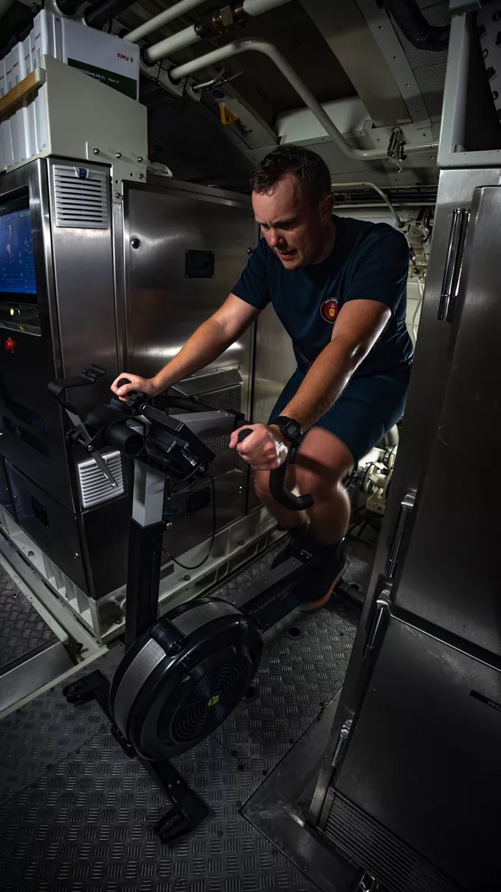 A crew member from the HSwMS Uppland uses his off-duty hours to cycle on an exercise bike on the submarine, 90 metres below the North Sea during Dynamic Monarch 24.

At Dynamic Monarch 24, the world’s most challenging submarine rescue exercise, Allies are testing various complex submarine rescue systems. The exercise is designed to practise interoperability among naval forces and streamline rescue operations in the most challenging of environments where reaction time and specialist equipment are key to saving lives. Dynamic Monarch 24 is taking place off the coast of Norway.