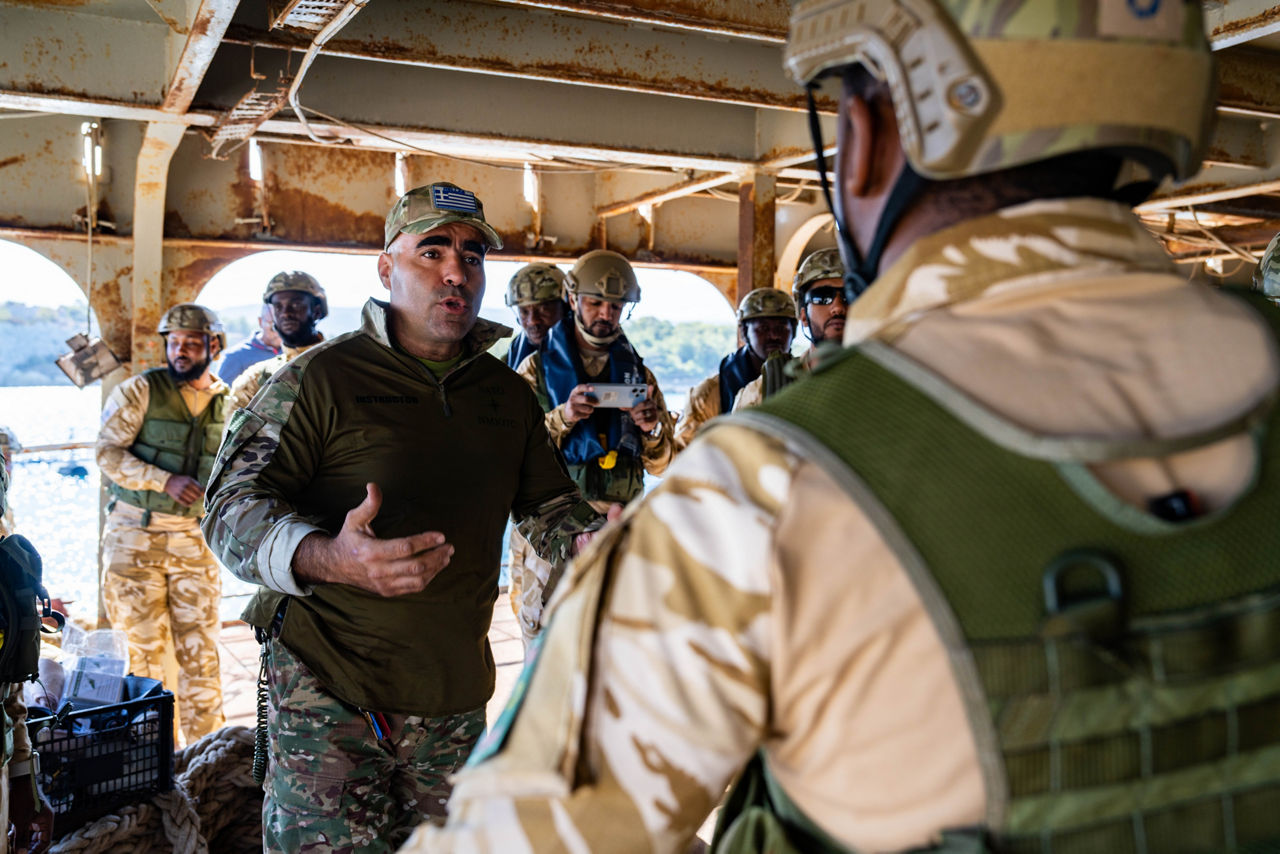 NATO trainer instructs Mauritanian sailors in first aid techniques.



Sailors of the Mauritanian Navy conducted a three week-training programme on maritime security operations, hosted by the NATO Maritime Interdiction Operational Training Centre (NMIOTC), located near Chania, Greece, from 21 October to 8 November 2024. These training activities were carried out within the framework of NATO’s Defence and Related Security Capacity Building (DCB) Initiative.

