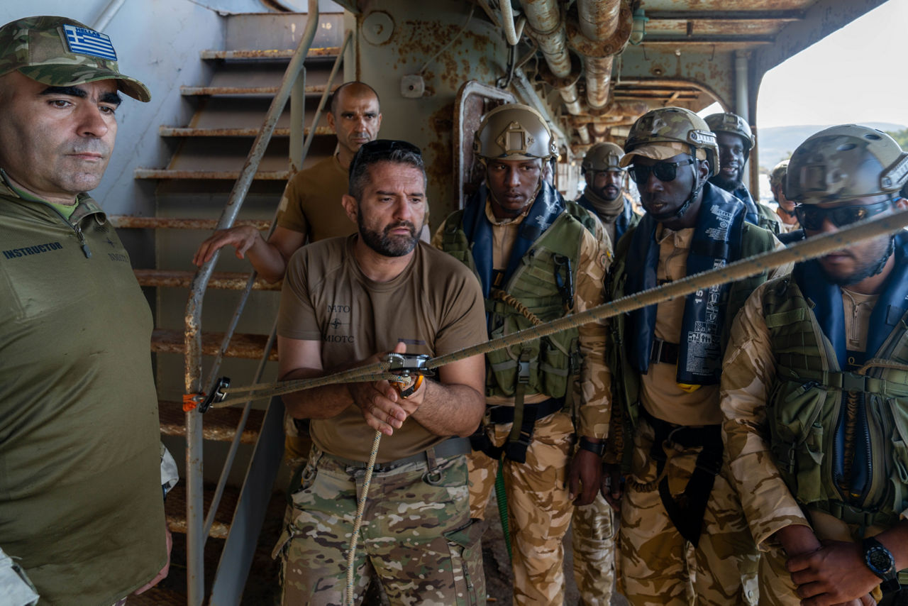 NATO trainer instructs Mauritanian sailors in medical evacuation techniques.



Sailors of the Mauritanian Navy conducted a three week-training programme on maritime security operations, hosted by the NATO Maritime Interdiction Operational Training Centre (NMIOTC), located near Chania, Greece, from 21 October to 8 November 2024. These training activities were carried out within the framework of NATO’s Defence and Related Security Capacity Building (DCB) Initiative.


