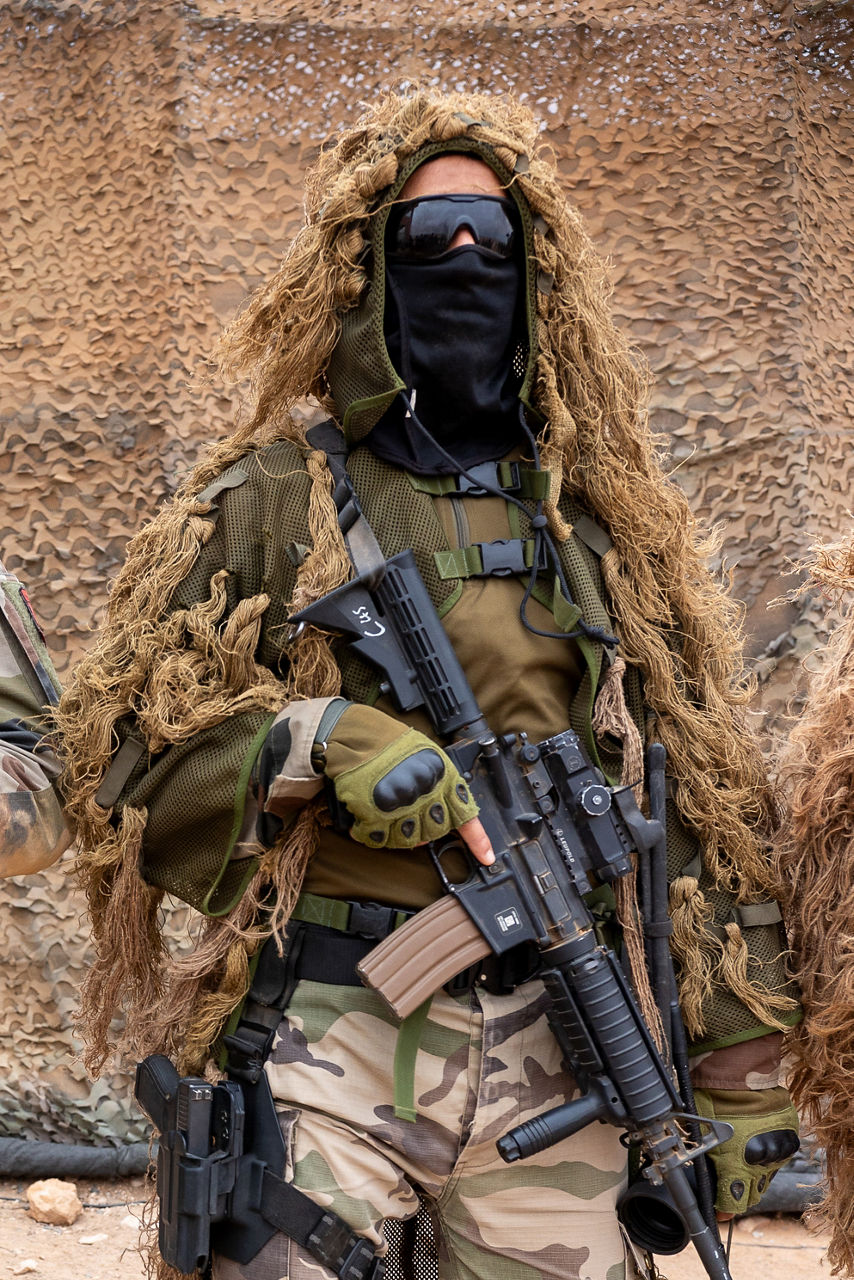 Moroccan Special Forces soldiers watch a brigade level display during exercise African Lion 25. 



Exercise ‘African Lion 2025’ saw 10,000 troops train together in Ghana, Morocco, Senegal and Tunisia. After two weeks of classroom training, the exercise culminated in a week-long planning exercise, combining land, air, sea, space and cyberspace challenges.

