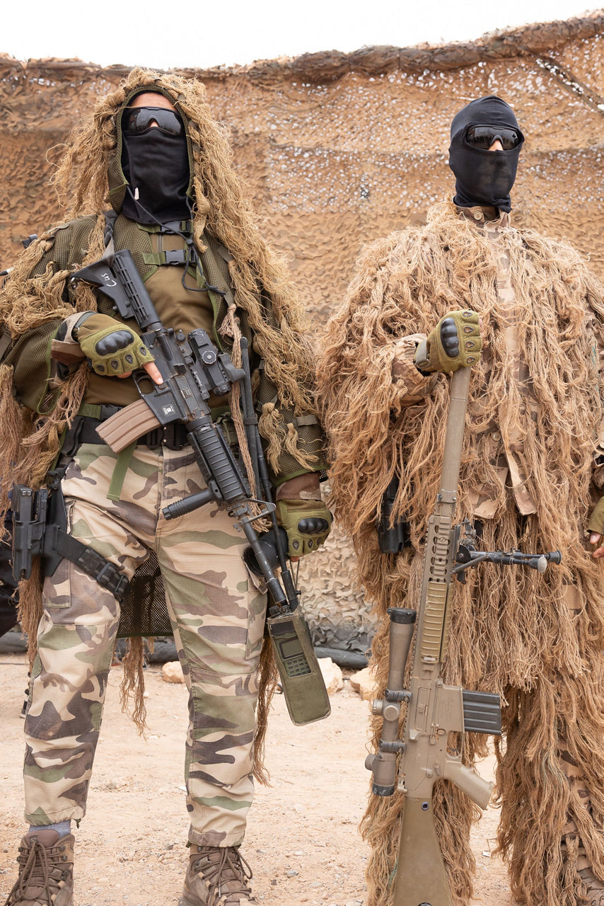 Moroccan Special Forces soldiers watch a brigade level display during exercise African Lion 25. 



Exercise ‘African Lion 2025’ saw 10,000 troops train together in Ghana, Morocco, Senegal and Tunisia. After two weeks of classroom training, the exercise culminated in a week-long planning exercise, combining land, air, sea, space and cyberspace challenges.

