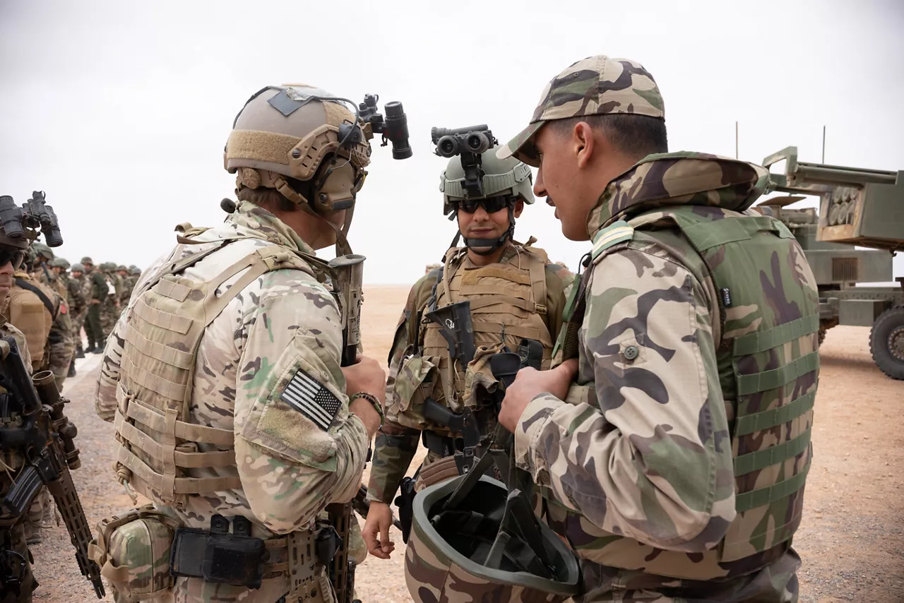Moroccan and U.S. soldiers discuss operational tactics during exercise African Lion 25.



Exercise ‘African Lion 2025’ saw 10,000 troops train together in Ghana, Morocco, Senegal and Tunisia. After two weeks of classroom training, the exercise culminated in a week-long planning exercise, combining land, air, sea, space and cyberspace challenges.

