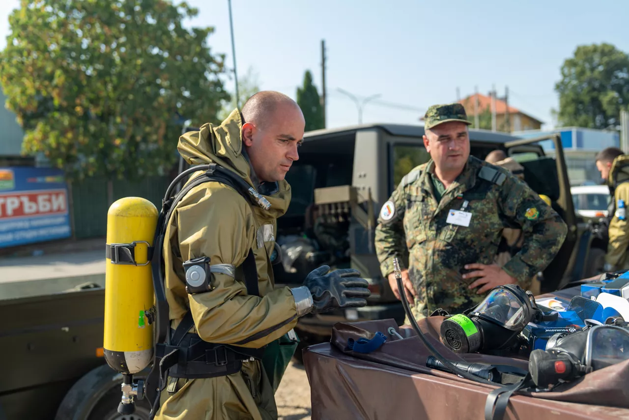 Members of the Bulgarian Armed Forces CBRN unit gear up for a chemical, biological, radiological, and nuclear (CBRN) defence exercise.

In one of the year’s largest and most complex civil emergency exercises, soldiers, scientists, and first responders trained in Bulgaria to strengthen coordination and readiness for large-scale disasters. The exercise, “Bulgaria 2025”, took place from 7 until 12 September 2025.