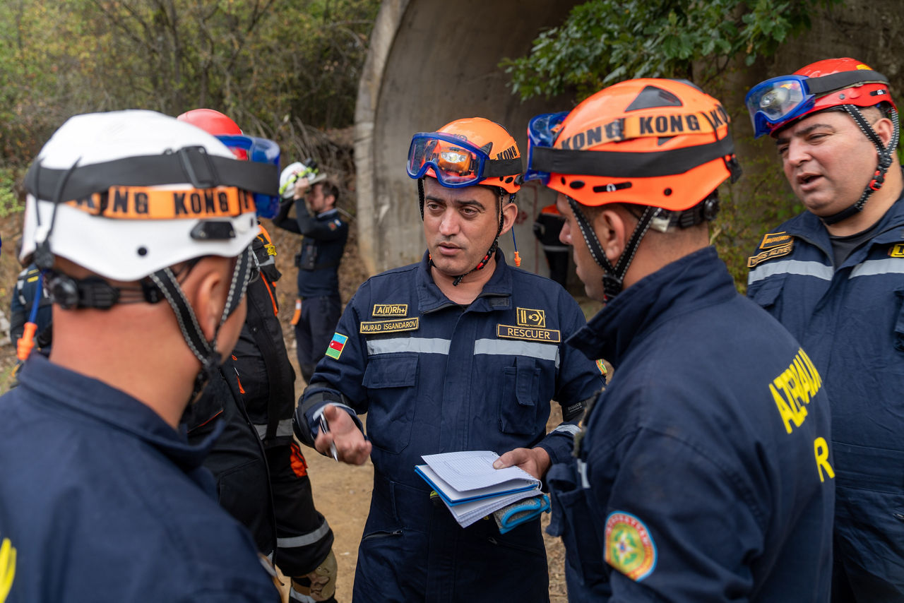 Members of Azerbaijan’s urban search and rescue team coordinate strategies during a search and rescue exercise.

In one of the year’s largest and most complex civil emergency exercises, soldiers, scientists, and first responders trained in Bulgaria to strengthen coordination and readiness for large-scale disasters. The exercise, “Bulgaria 2025”, took place from 7 until 12 September 2025.