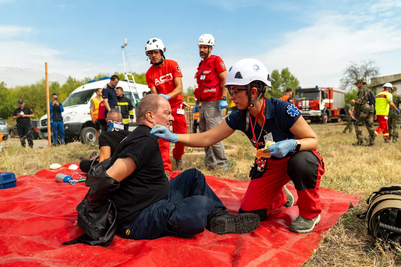 Bulgarian paramedics assess a simulated casualty during a chemical, biological, radiological, and nuclear (CBRN) defence exercise.

In one of the year’s largest and most complex civil emergency exercises, soldiers, scientists, and first responders trained in Bulgaria to strengthen coordination and readiness for large-scale disasters. The exercise, “Bulgaria 2025”, took place from 7 until 12 September 2025.