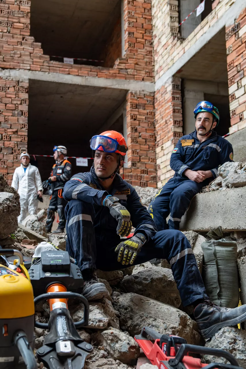 Members of the Azerbaijani search and rescue team take a break after cutting through debris during an urban rescue training exercise.

In one of the year’s largest and most complex civil emergency exercises, soldiers, scientists, and first responders trained in Bulgaria to strengthen coordination and readiness for large-scale disasters. The exercise, “Bulgaria 2025”, took place from 7 until 12 September 2025.
