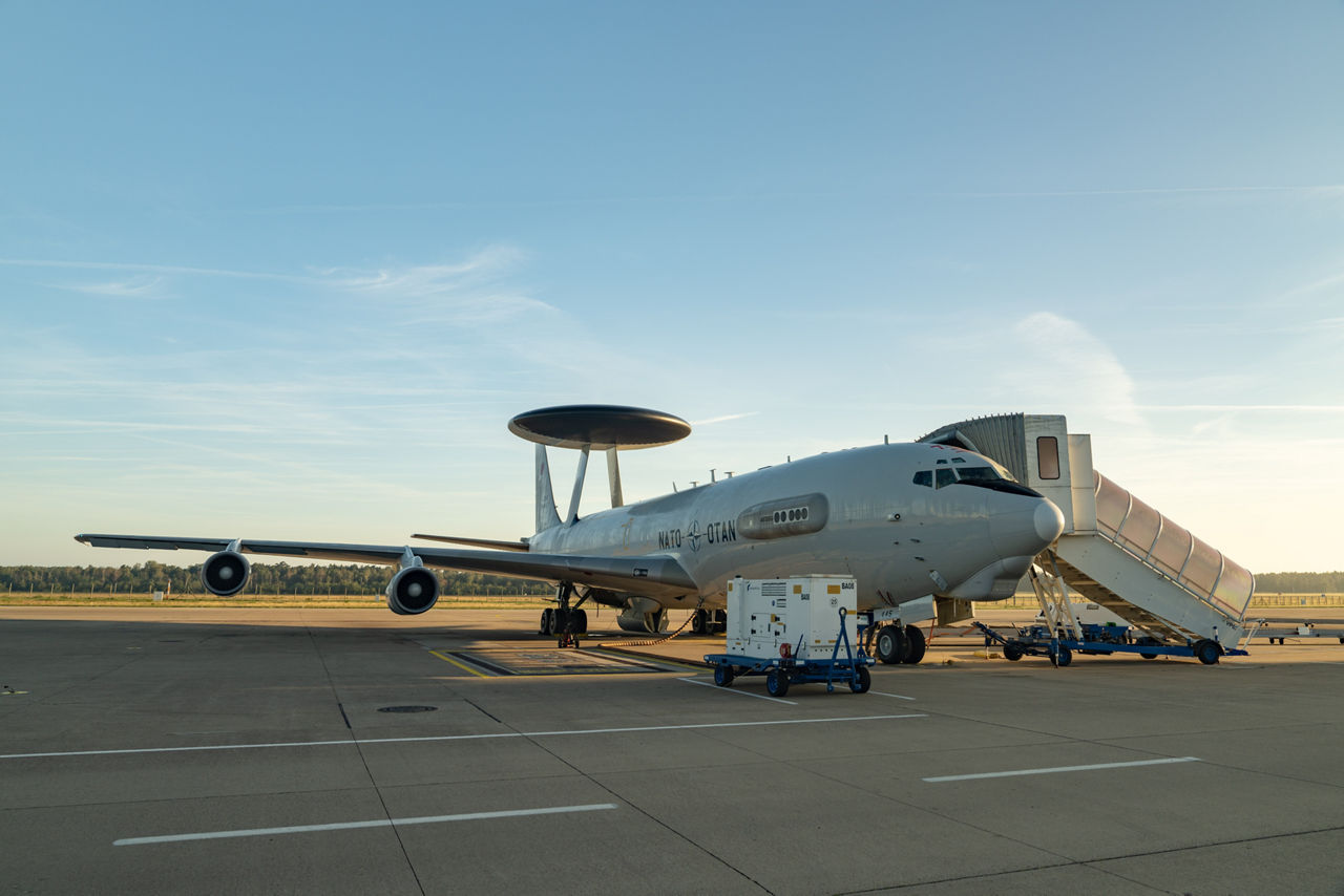 An E-3A Airborne Warning & Control System (AWACS) aircraft sits on the tarmac at NATO Air Base Geilenkirchen, Germany.

The first surveillance flight of NATO’s Airborne Warning and Control System (AWACS) was conducted over NATO’s eastern flank in support of a military activity called “Eastern Sentry” on 19 September 2025. This multi-domain activity is a direct response to recent airspace violations — including the incursion of multiple Russian drones into Polish airspace on 10 September 2025. Eastern Sentry will further strengthen NATO’s posture to shield and protect all Allies.