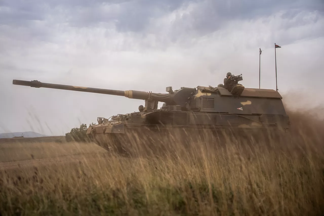 A Hungarian PZH2000 mobile artillery unit moves through grassland. Exercise Adaptive Hussars 2025 was the Hungarian Defence Forces’ largest and most complex military exercise since Hungary’s accession to NATO in 1999. It promoted cooperation between all NATO members contributing to the NATO’s multinational battlegroup in Hungary, and boosted Hungary’s  defence capabilities along with NATO defence plans and procedures.