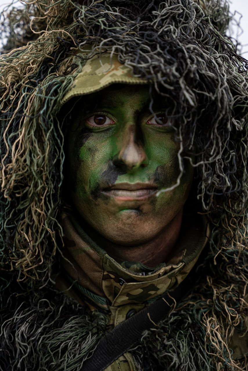 A Hungarian army sniper sporting a full ghillie suit and face camouflage. Exercise Adaptive Hussars 2025 was the Hungarian Defence Forces’ largest and most complex military exercise since Hungary’s accession to NATO in 1999. It promoted cooperation between all NATO members contributing to the NATO’s multinational battlegroup in Hungary, and boosted Hungary’s  defence capabilities along with NATO defence plans and procedures.