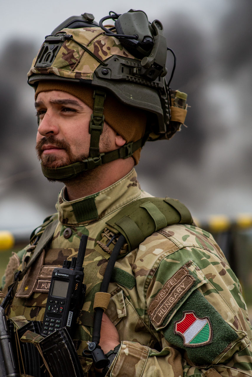 A Hungarian soldier stands ready to receive orders. Exercise Adaptive Hussars 2025 was the Hungarian Defence Forces’ largest and most complex military exercise since Hungary’s accession to NATO in 1999. It promoted cooperation between all NATO members contributing to the NATO’s multinational battlegroup in Hungary, and boosted Hungary’s  defence capabilities along with NATO defence plans and procedures.