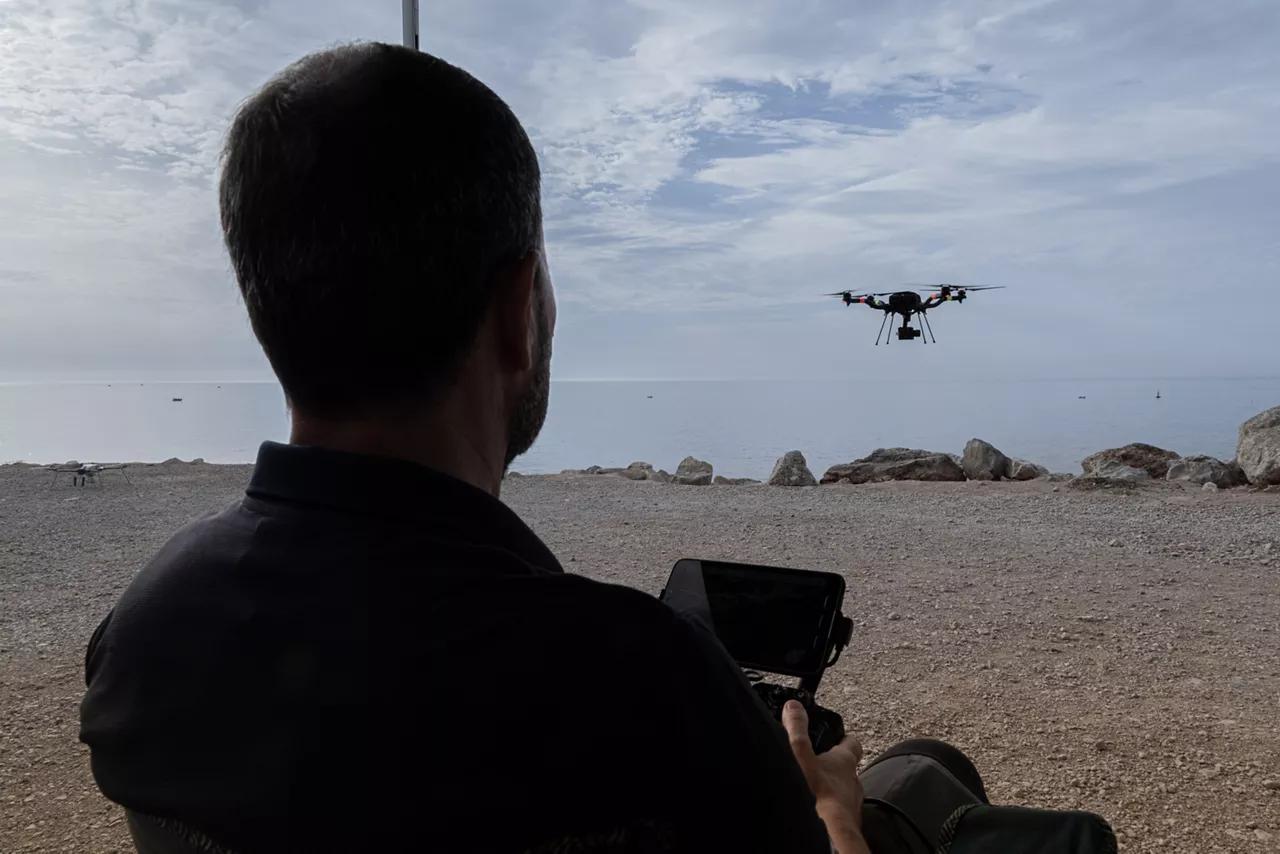 Crew member tests drone's ability to detect drifting mines at REPMUS 2025.

During Exercises REPMUS and Dynamic Messenger 2025, NATO united Allied forces, partners, industry, and researchers to trial uncrewed systems, advanced sensing, and communications in real-life tests scenarios at sea. NATO’s Defence Innovation Accelerator (DIANA) helps turn new ideas into real capabilities by connecting innovators with real-world trials, making it easier for Allies to adopt technology, work together, and use innovative technologies to strengthen defence.