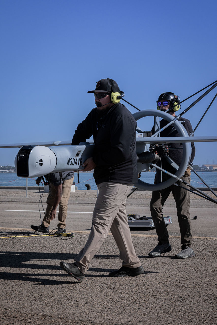 Crew members carry unmanned aerial vehicle at REPMUS 2025.

During Exercises REPMUS and Dynamic Messenger 2025, NATO united Allied forces, partners, industry, and researchers to trial uncrewed systems, advanced sensing, and communications in real-life tests scenarios at sea. NATO’s Defence Innovation Accelerator (DIANA) helps turn new ideas into real capabilities by connecting innovators with real-world trials, making it easier for Allies to adopt technology, work together, and use innovative technologies to strengthen defence.