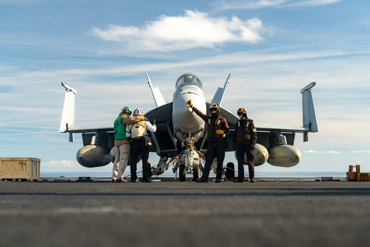 US Navy sailors conduct pre-flight checks on a US Navy F/A-18 Super Hornet aboard the USS Gerald R. Ford.

The USS Gerald R. Ford sailed under NATO command for Neptune Strike 25-3, a long-planned enhanced vigilance activity designed to demonstrate the complex integration of high-end maritime strike capabilities and air-land integration. It took place from 22 until 26 September 2025.