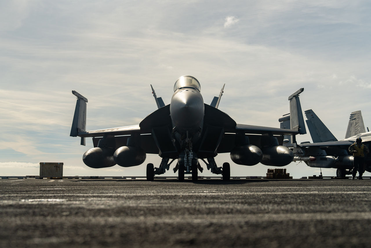 A US Navy F/A-18 Super Hornet parked on the flight deck of the USS Gerald R. Ford.

The USS Gerald R. Ford sailed under NATO command for Neptune Strike 25-3, a long-planned enhanced vigilance activity designed to demonstrate the complex integration of high-end maritime strike capabilities and air-land integration. It took place from 22 until 26 September 2025.