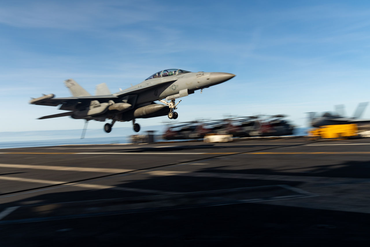A US Navy F/A-18 Super Hornet lands on the flight deck of the USS Gerald R. Ford.

The USS Gerald R. Ford sailed under NATO command for Neptune Strike 25-3, a long-planned enhanced vigilance activity designed to demonstrate the complex integration of high-end maritime strike capabilities and air-land integration. It took place from 22 until 26 September 2025.