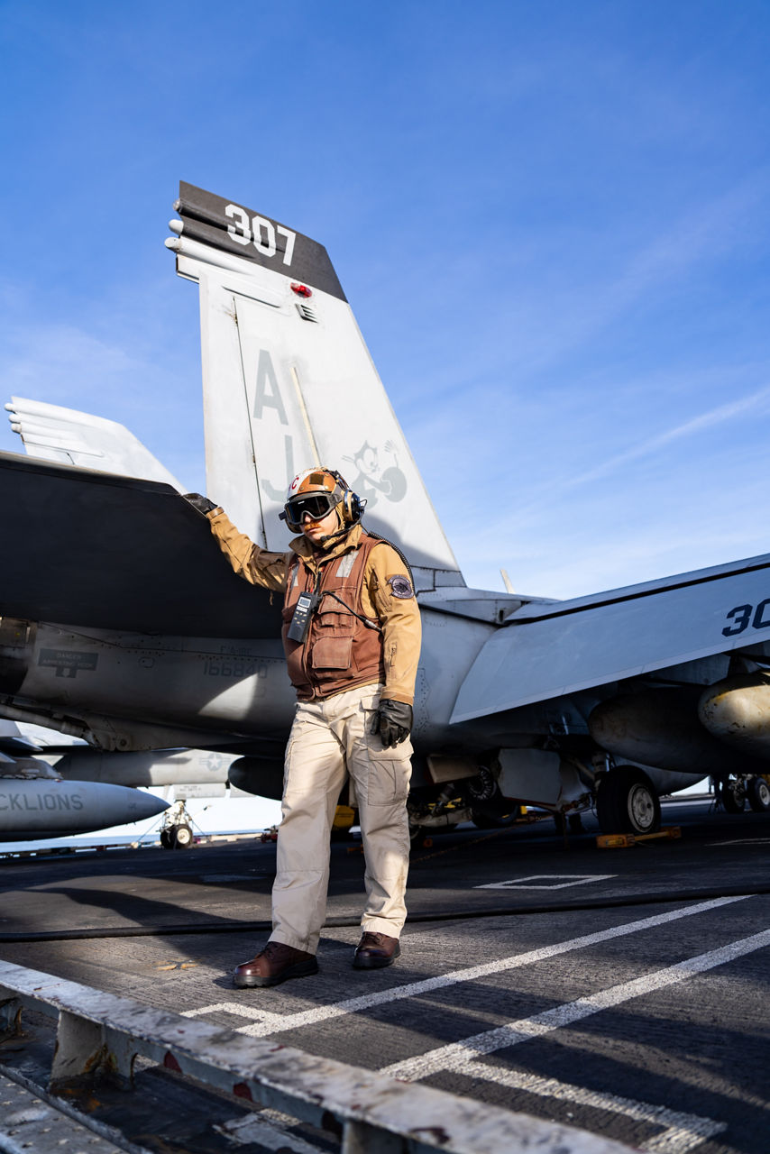 A US Navy sailor conduct checks on a US Navy F/A-18 Super Hornet aboard the USS Gerald R. Ford.

The USS Gerald R. Ford sailed under NATO command for Neptune Strike 25-3, a long-planned enhanced vigilance activity designed to demonstrate the complex integration of high-end maritime strike capabilities and air-land integration. It took place from 22 until 26 September 2025.