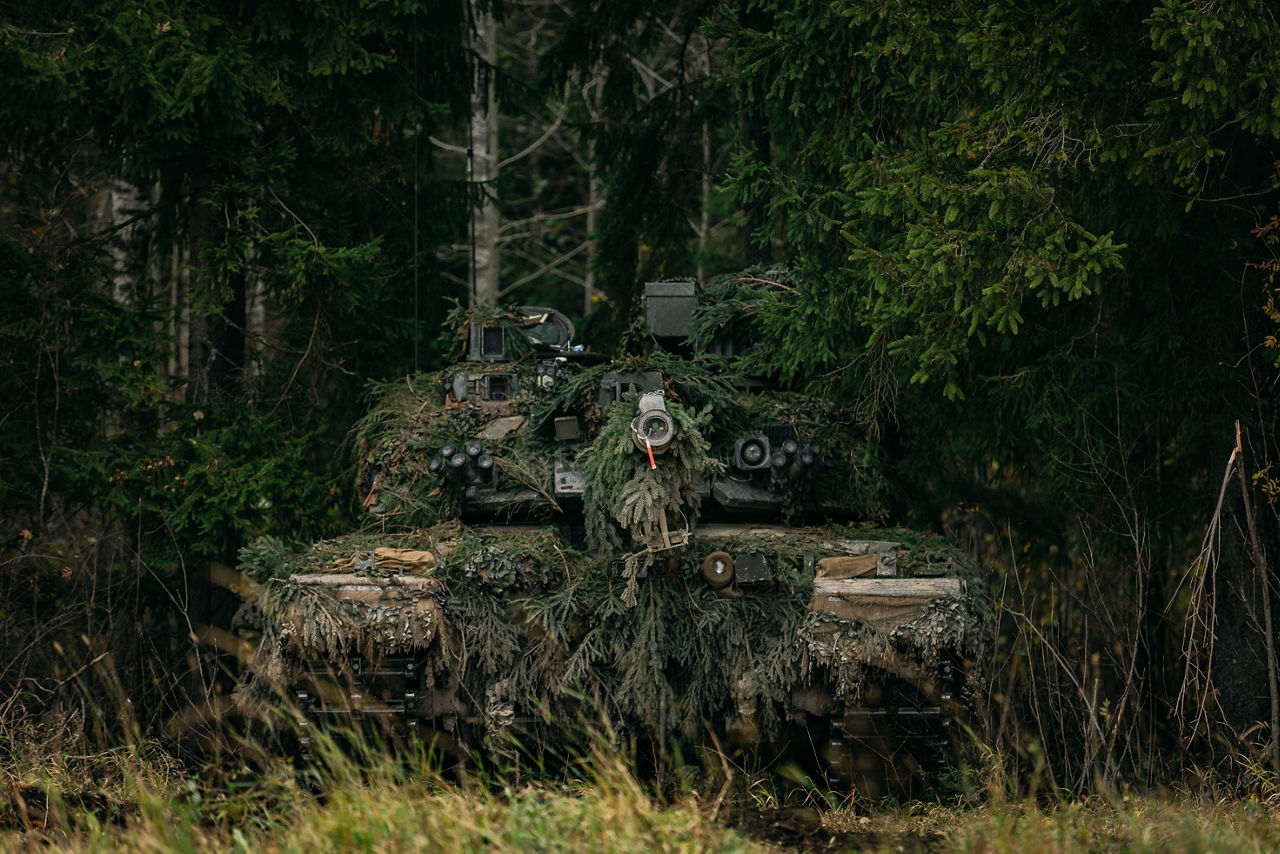 A British Challenger 2 tank crew plan an ambush whilst camouflaged during Exercise Bold Eagle in Estonia. 



NATO Allies tested their quick reaction defence skills in Estonia during Exercise Bold Panzer, strengthening NATO’s ability to respond to any incursion into Estonian territory. The exercise brought together forces from Canada, Estonia, France, Latvia, Poland, Slovenia and the UK over two weeks, ensuring their readiness to protect Estonia and the Alliance.